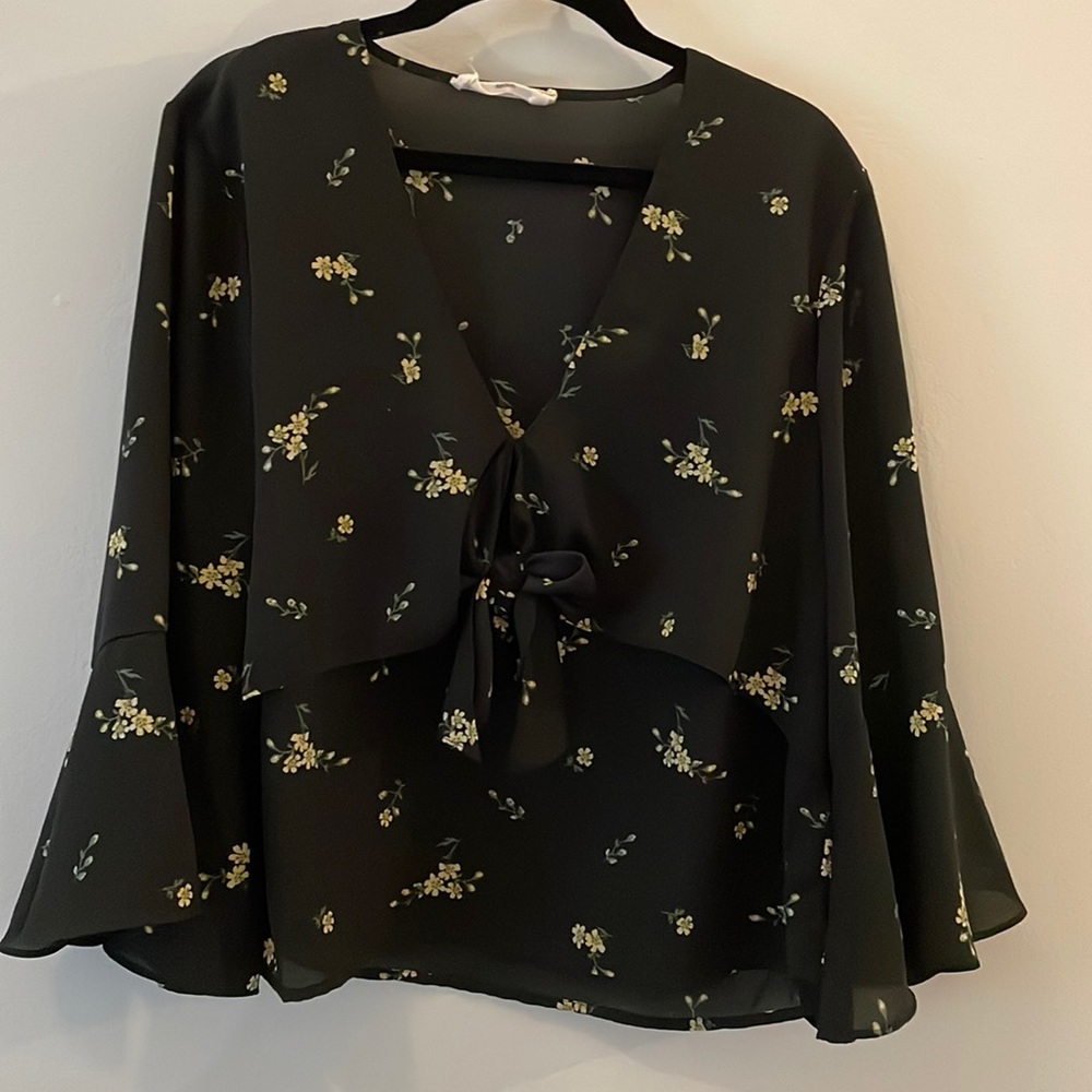 Black top with tie in the front